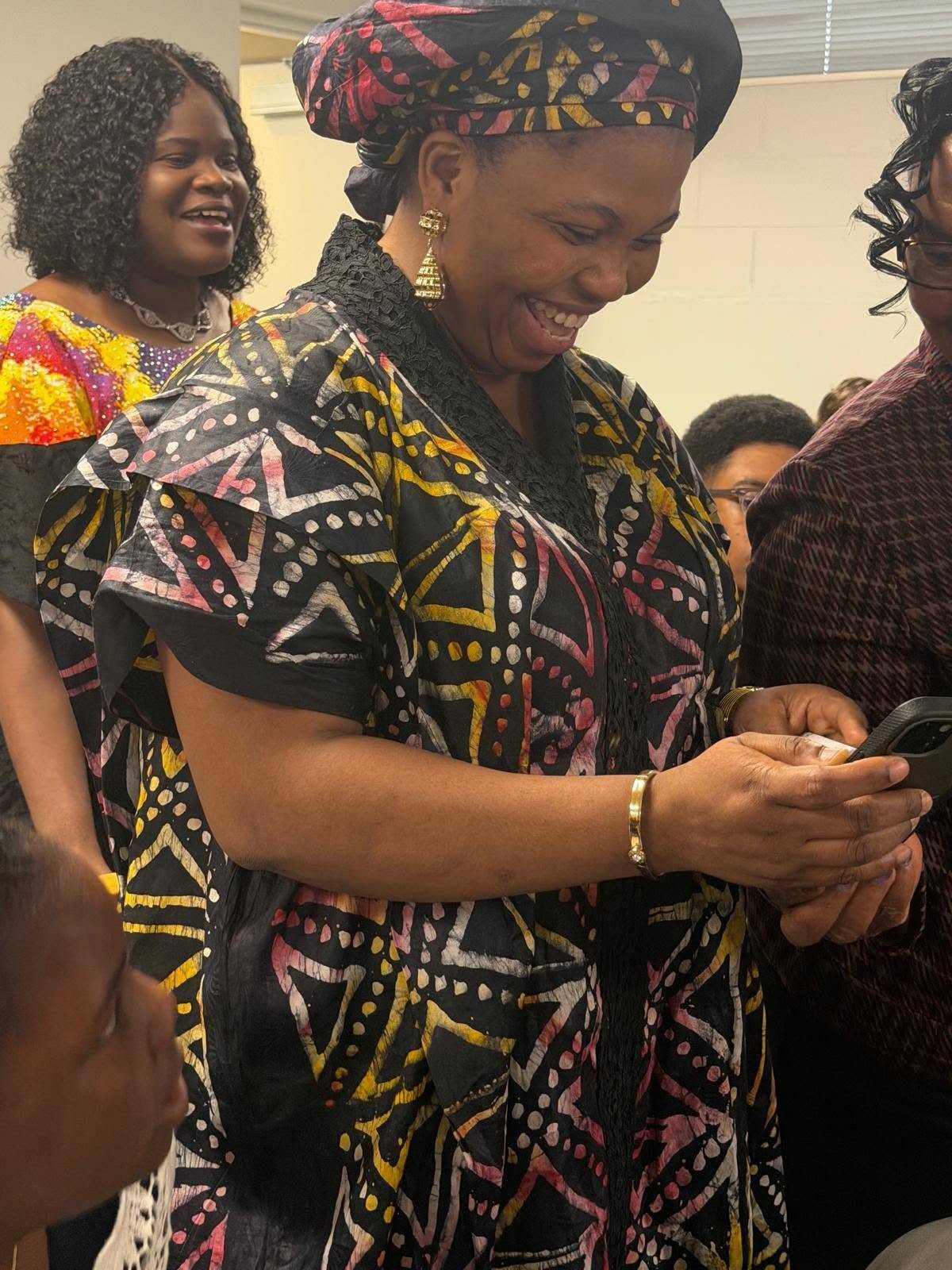A joyful RCCG Citadel of Hope church member during a fellowship moment